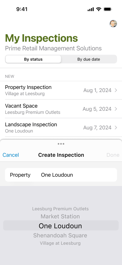 Mobile create-inspection flow with a scrolling wheel picker open to choose a property.